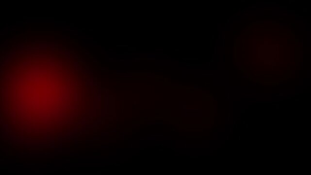 Dark red light leak overlay with a subtle glowing effect for cinematic video transitions and mood.