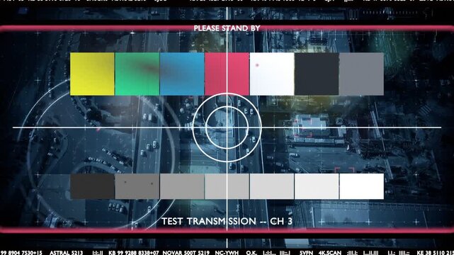 Broadcast test starting, test-pattern overlay pulsing, rotating and flickering to show diagnostics