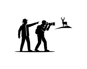 Naklejka premium silhouette of two men taking pictures of a deer on a hill