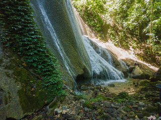 Majestic view of Embon Waterfall and river stream scenery at Pasie Raya, Aceh Jaya, Indonesia © MUAZ JAFFAR