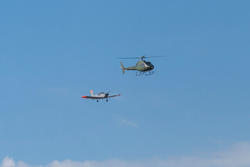 Modern military training helicopters and training airplane flying over Budapest, Hungary © ZenitX