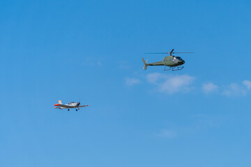 Modern military training helicopters and training airplane flying over Budapest, Hungary © ZenitX