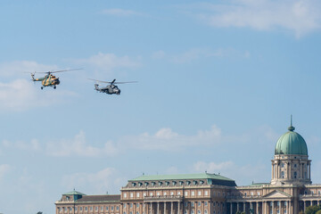 Soviet-made black old military helicopters flying in the sky in Budapest © ZenitX