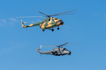 Soviet-made black old military helicopters flying in the sky in Budapest © ZenitX