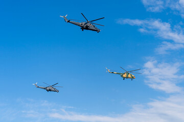 Soviet-made black old military helicopters flying in the sky in Budapest © ZenitX