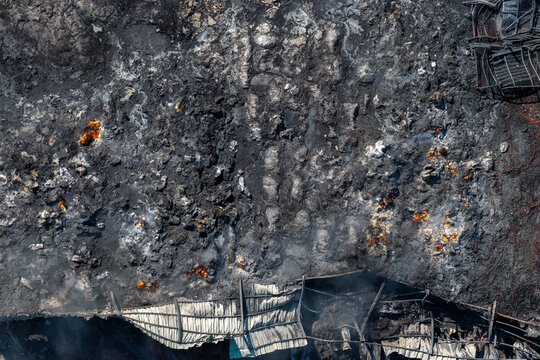 Charred Ground and Collapsed Metal Structures After the Oraiokastro Wildfire