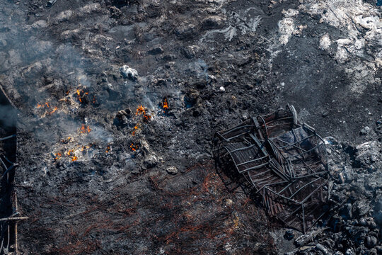 Charred Ground and Collapsed Metal Structures After the Oraiokastro Wildfire