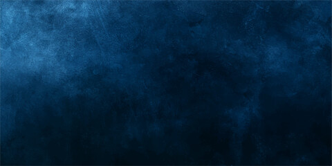Obraz premium Deep Blue Nebula Effect: An abstract, dark blue background with subtle smoky or misty textures, evoking a sense of depth and mystery.