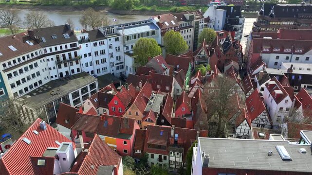 Revealing Shot of Schnoor quarter in Bremen, Germany, UNESCO World Heritage, Aerial View of Downtown old town street.