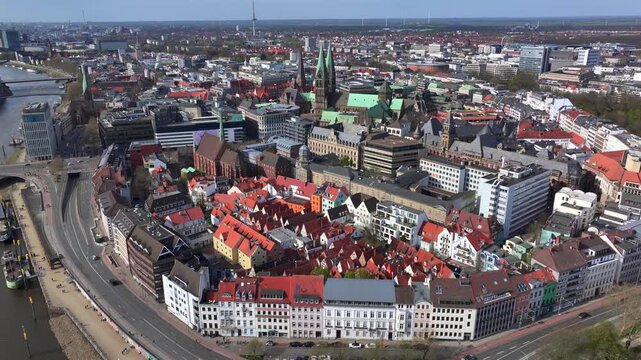 Revealing Shot of Schnoor quarter in Bremen, Germany, UNESCO World Heritage, Aerial View of Downtown old town street.