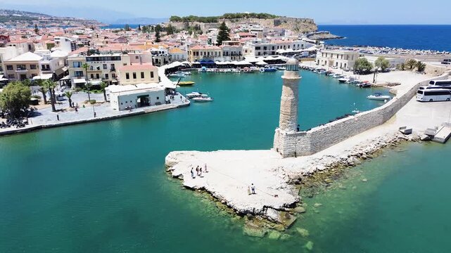 harbor and lighthouse of Rethymno old town, Crete, Greece, retro toned