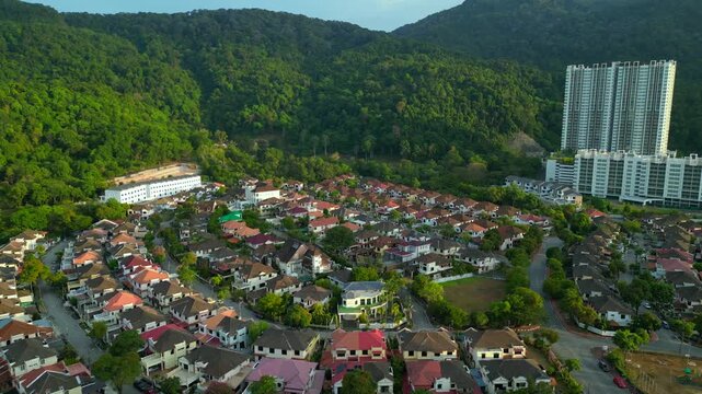 Row houses esidential area in Ferringhi hills. Magic aerial view drone