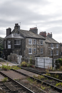Knaresborough, United Kingdom - 14 July 2026: View of historic stone buildings and railway station in Knaresborough, featuring traditional architecture and slate roofs.