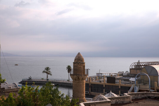 Beautiful Waterfront View of the Sea of Galilee with Historic Tower in Tiberias, Israel