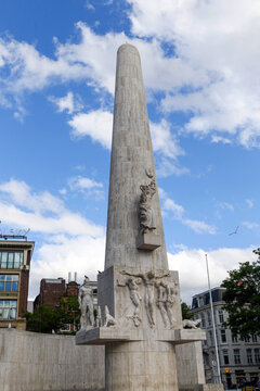 National Monument at Dam Square Under Blue Sky in Amsterdam