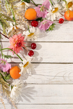 Abstract floral arrangement, background and festive floral concept for summer flyer,banner featuring beautiful garden flowers, daisies, hydrangeas, phlox, cherry blossoms and lilies, reminiscent