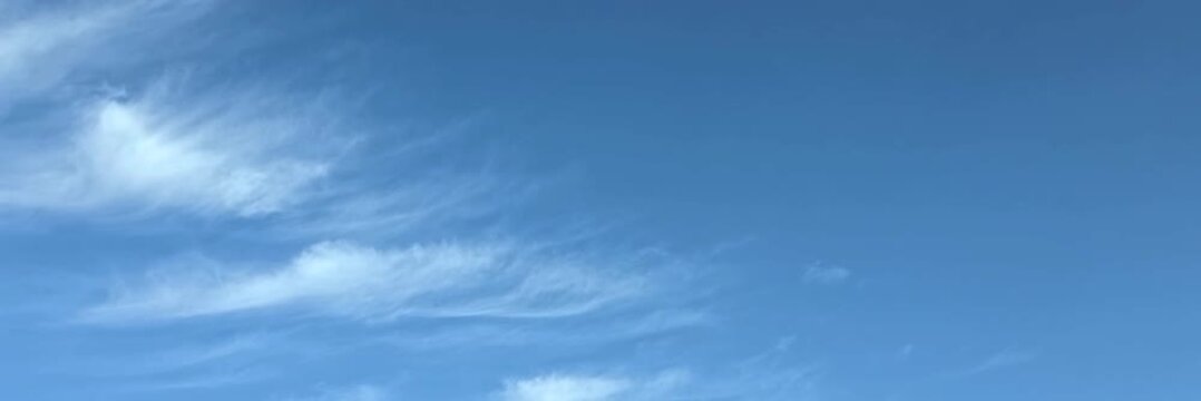 Cloudscape, Timelapse of Wide Panoramic Blue Sky Background with Feathery Cirrus Clouds for Banner