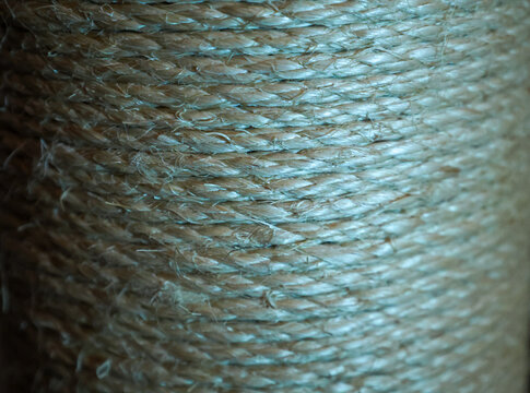 Close Up of Natural Sisal Rope Coiled Texture in Warm Tan Tones