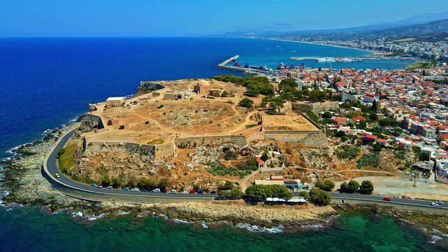 Aerial view of the historic Fortezza of Rethymno fortress overlooking the Mediterranean Sea and the coastal city of Rethymno in Crete, Greece.