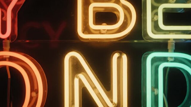Multi colored neon Cyber Monday sign on dark background