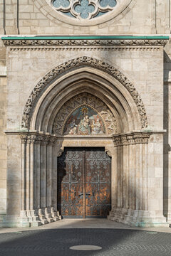 Gothic West Gate portal with a mosaic tympanum and carved arch of Matthias Church in Budapest, Hungary