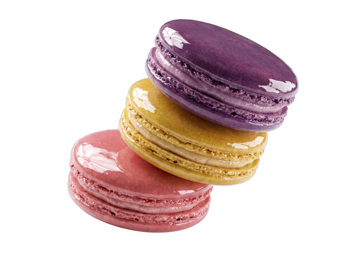 Three delicious colorful french macarons stacked together as a sweet dessert treat isolated on transparent background