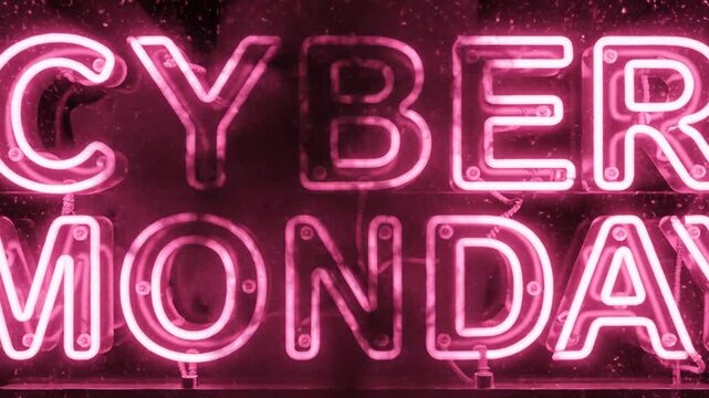 Pink neon Cyber Monday text with glowing particles explosion