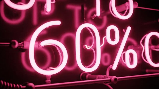 Pink neon sign showing up to sixty percent discount