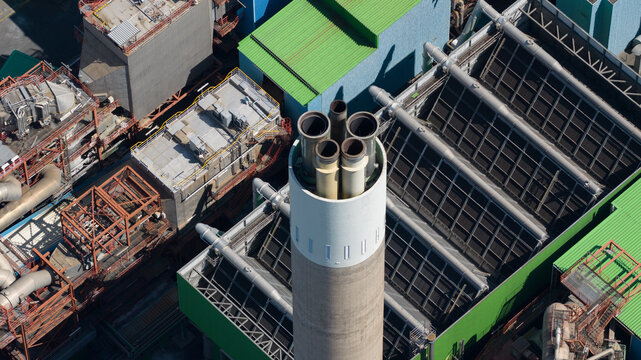 Aerial view of the Abfallkraftwerk Herten waste to energy plant with complex industrial piping, chimneys, and metal structures, Herten, Nordrhein Westfalen, Germany.