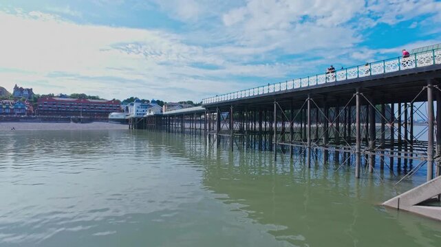 Drone video of Penarth Pier, Promenade, Beach, Cliffs and Coast