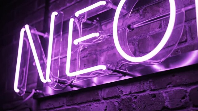 Purple neon text sign on dark brick wall