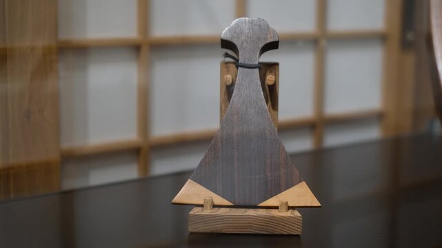 Traditional wooden plectrum for japanese biwa lute, close up