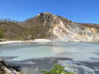 Oyunuma Geothermal Crater Lake in Noboribetsu, Hokkaido, Japan © Yukari S