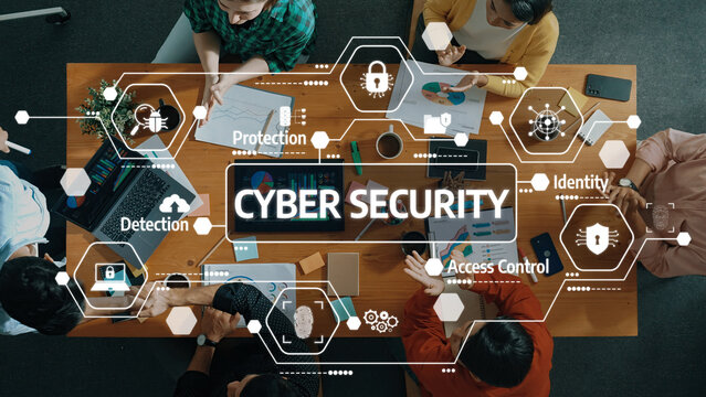 Comprehensive Cyber Security Strategy Meeting with Diverse Team Analyzing Data and Implementing Protection Measures in Modern Workspace. Amity