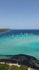 Obraz premium Drone View of Bright Turquoise Mediterranean Sea in Corsica, France