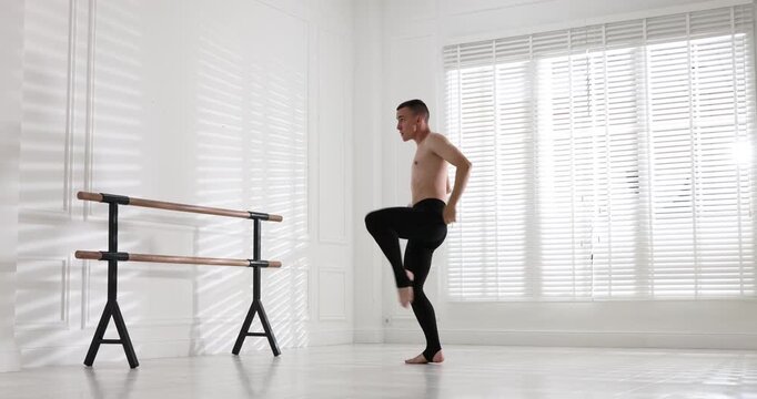 Professional dancer practicing moves in dance studio