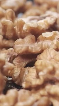 Macro close up of shelled walnuts in a pile