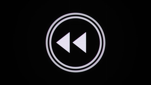 Rewind sign Glowing white icon with circle on black background