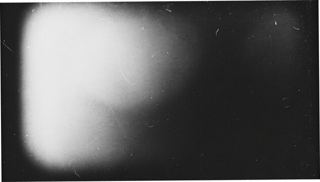 Retro film overlay with light leaks, scratches and dust on black background, vintage grain texture for photo editing, cinematic effects and distressed graphic design.