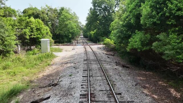 Aerial Overhead Tracking Shot of Railroad Tracks, Wooden Sleepers and Gravel Ballast