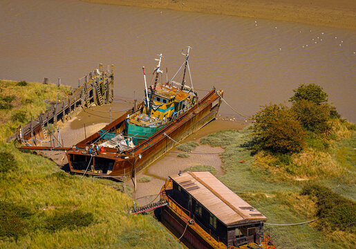 Boats at Low Tide Aerial View in Sussex Estuary and Riverside Boatyard