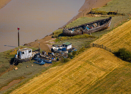 Boats at Low Tide Aerial View in Sussex Estuary and Riverside Boatyard