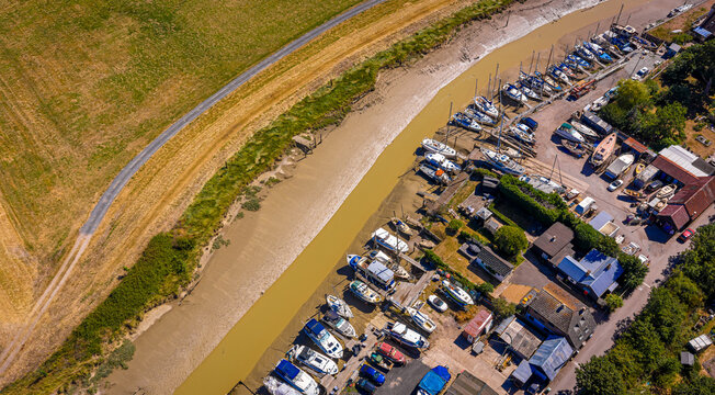 Boats at Low Tide Aerial View in Sussex Estuary and Riverside Boatyard