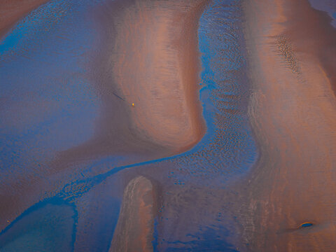 Low Tide Sand Patterns Aerial View of Coastal Beach Texture and Tidal Flow