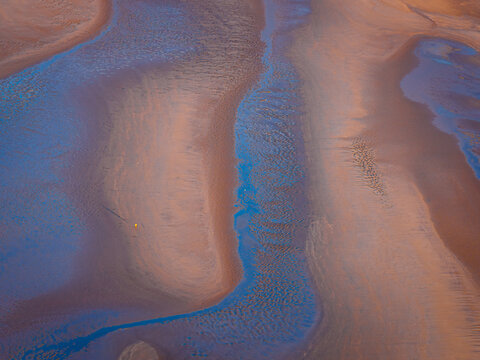 Low Tide Sand Patterns Aerial View of Coastal Beach Texture and Tidal Flow