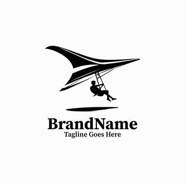 Clean black vector icon of a hang glider pilot gliding through the air, extreme air sports logo on white background