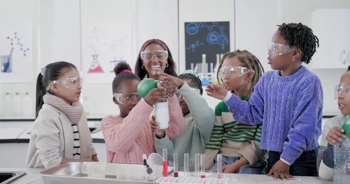 African American teacher with teen students adding to bottle, inflating balloon, teaching science