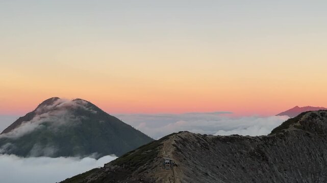 This is sunrise and fog in Ijen Mountain in East Java, Indonesia