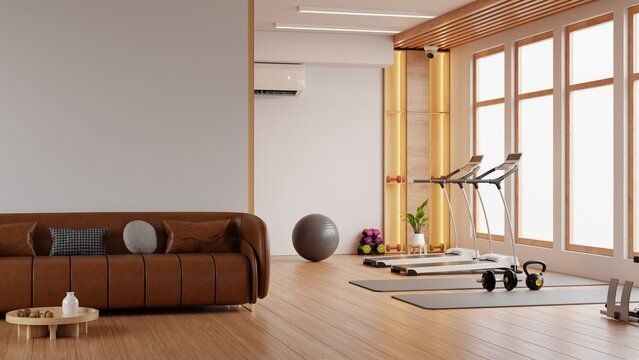 Modern home gym interior with fitness equipment treadmills and brown leather sofa near bright windows- 3D rendering