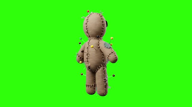 A fabric voodoo doll character with sewing pins stuck into it isolated on a bright green chroma key background. Ideal for horror visual effects, Halloween content, mystical themes, and spooky animatio